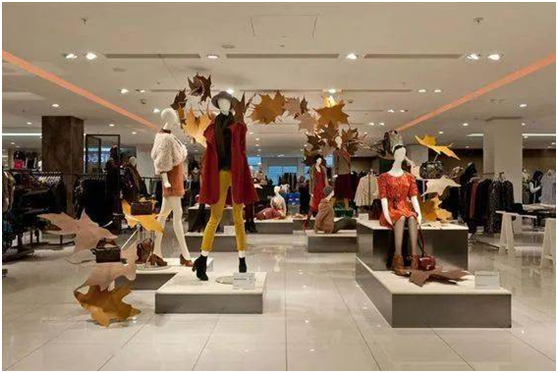 Good use of props and mannequins to create autumn atmosphere  
