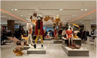 Good use of props and mannequins to create autumn atmosphere  